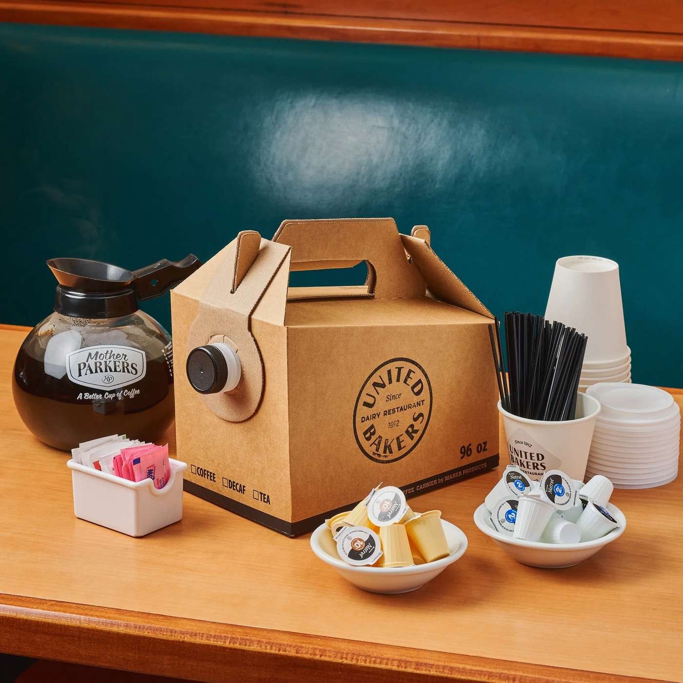 Fresh coffee service with insulated dispensers, cups and syrups